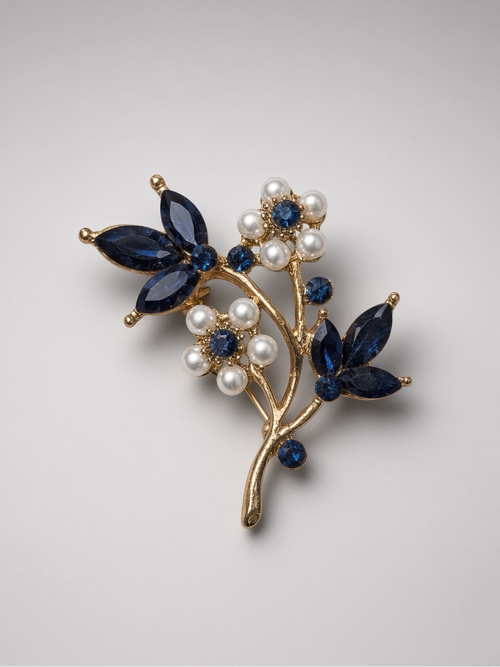 Gold Tone Floral Brooch with Navy Blue Crystals and Pearls Unsigned